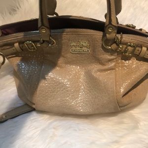 Gold coach bag